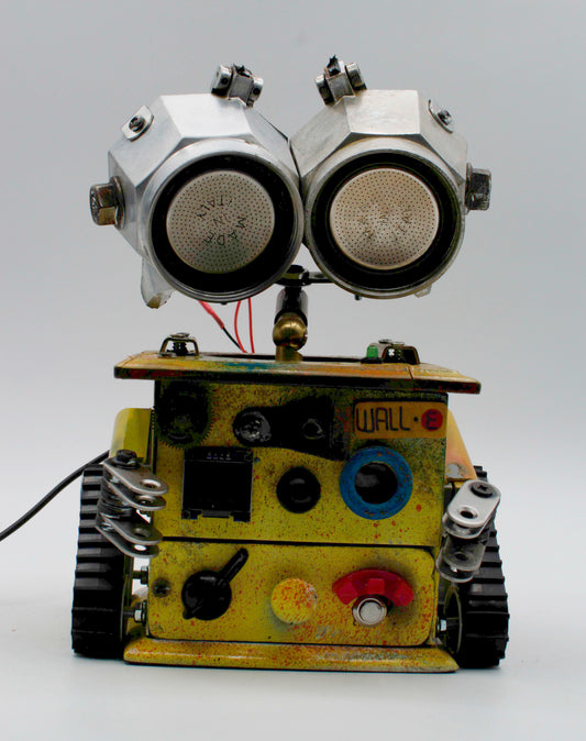 Graziosa lampada creata stile wall e in metallo giallo e argento con grandi occhi metallici e suono fatta a mano
