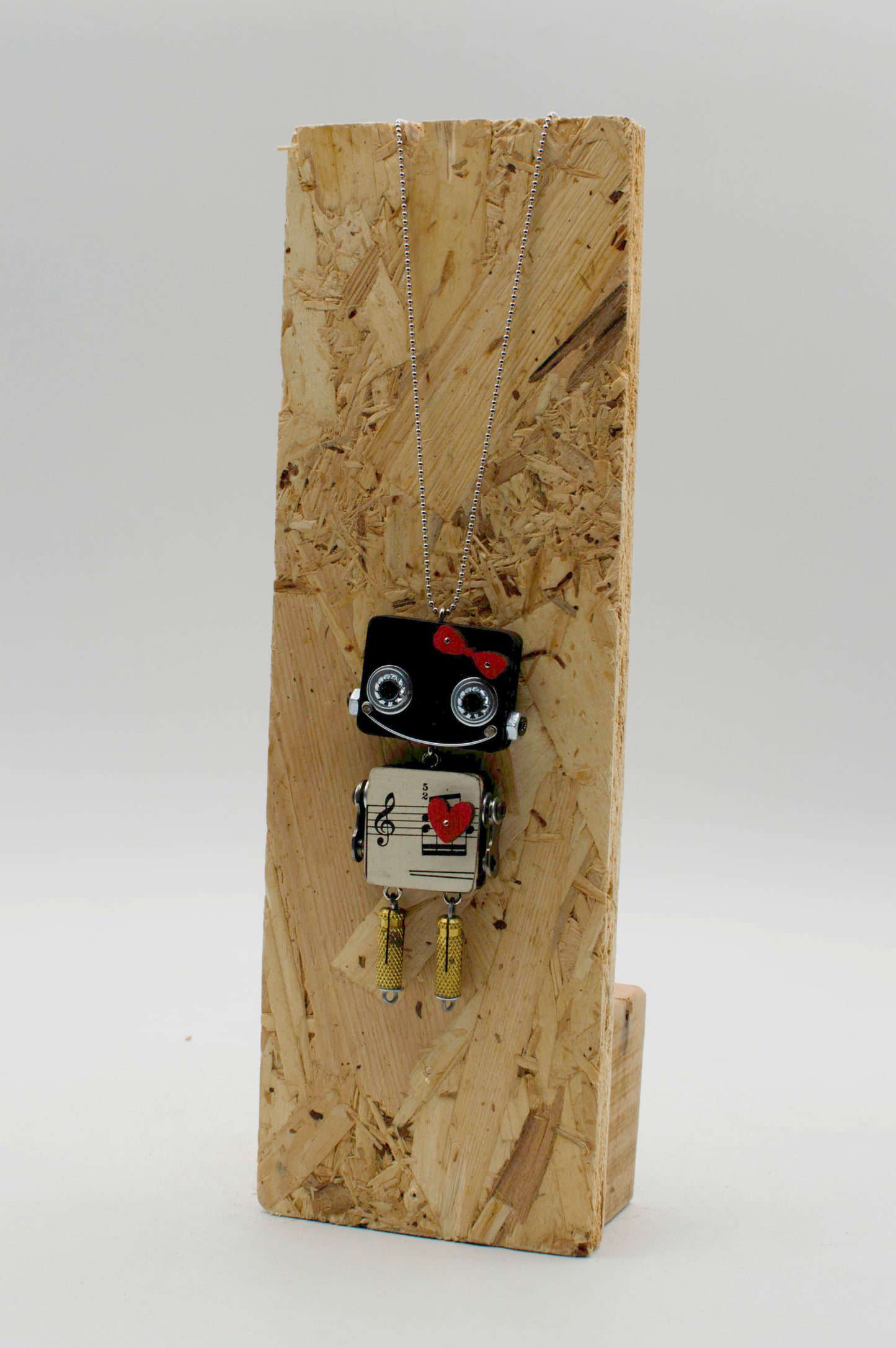 Ciondolo robot in legno tagliato a laser nero e argento con design di nota musicale collana pendente fatta a mano