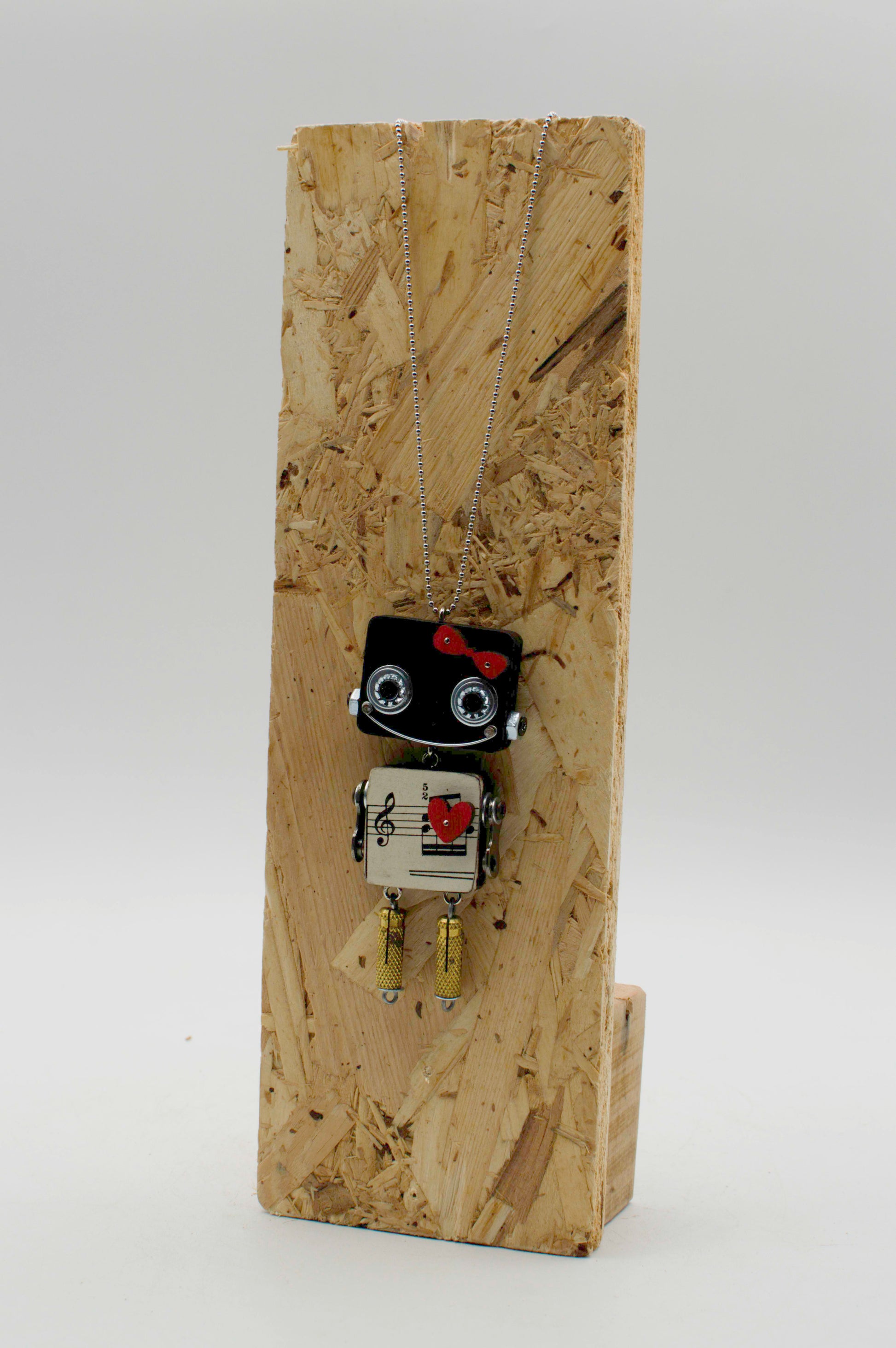 Ciondolo robot in legno tagliato a laser nero e argento con design di nota musicale collana pendente fatta a mano