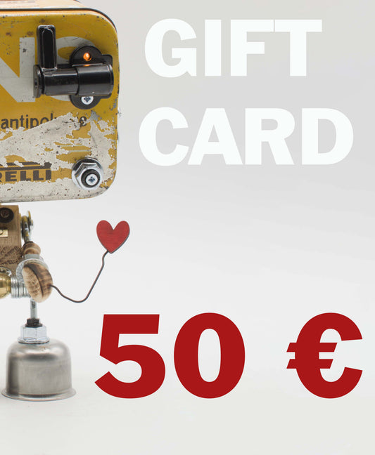 Porta gift card in metallo vintage giallo con componenti meccanici neri e palloncino rosso a forma di cuore