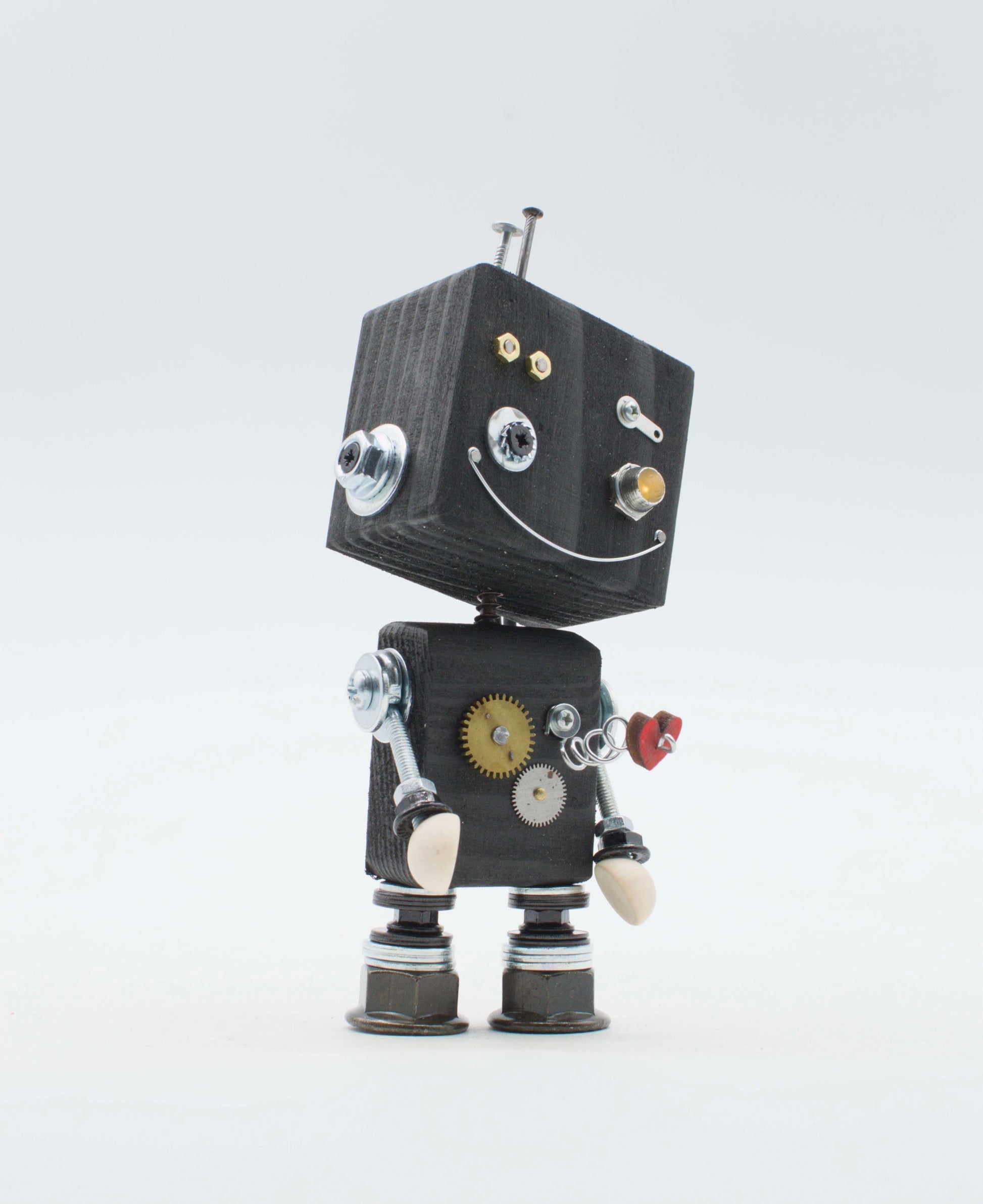 Lampada di legno a batteria stile robot nero con ingranaggi metallici e sorriso di bulloni modello robot fatto a mano