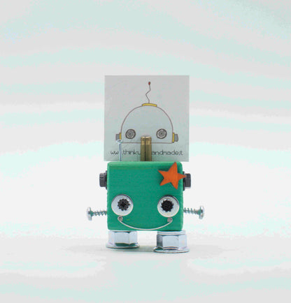 Portafoto da tavolo robot in verde menta con occhi a vite argento, stella decorativa e piedi trasparenti in plastica