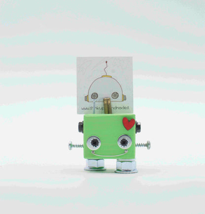 Portafoto da tavolo robot in verde menta con braccia a viti argento piedi trasparenti e cuore rosa sul petto