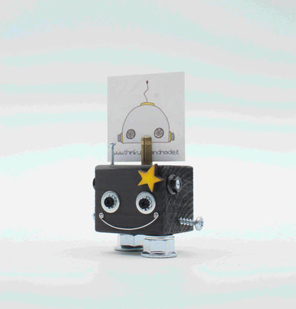 Portafoto da tavolo robot grigio a forma di cubo con occhi argento sorriso e stella gialla fatto a mano