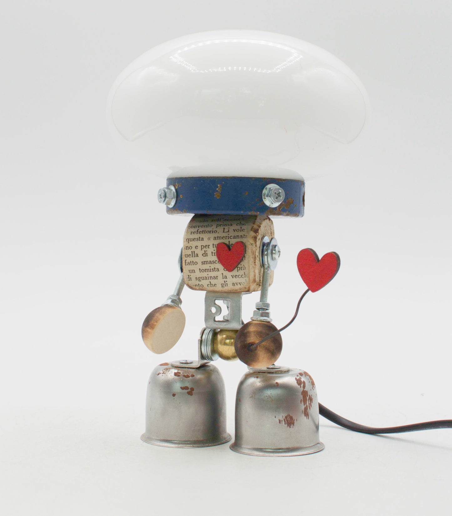 Graziosa lampada creata con forma di robot tavolo stile fanale bianca con collarino blu e piedi a campana metallici