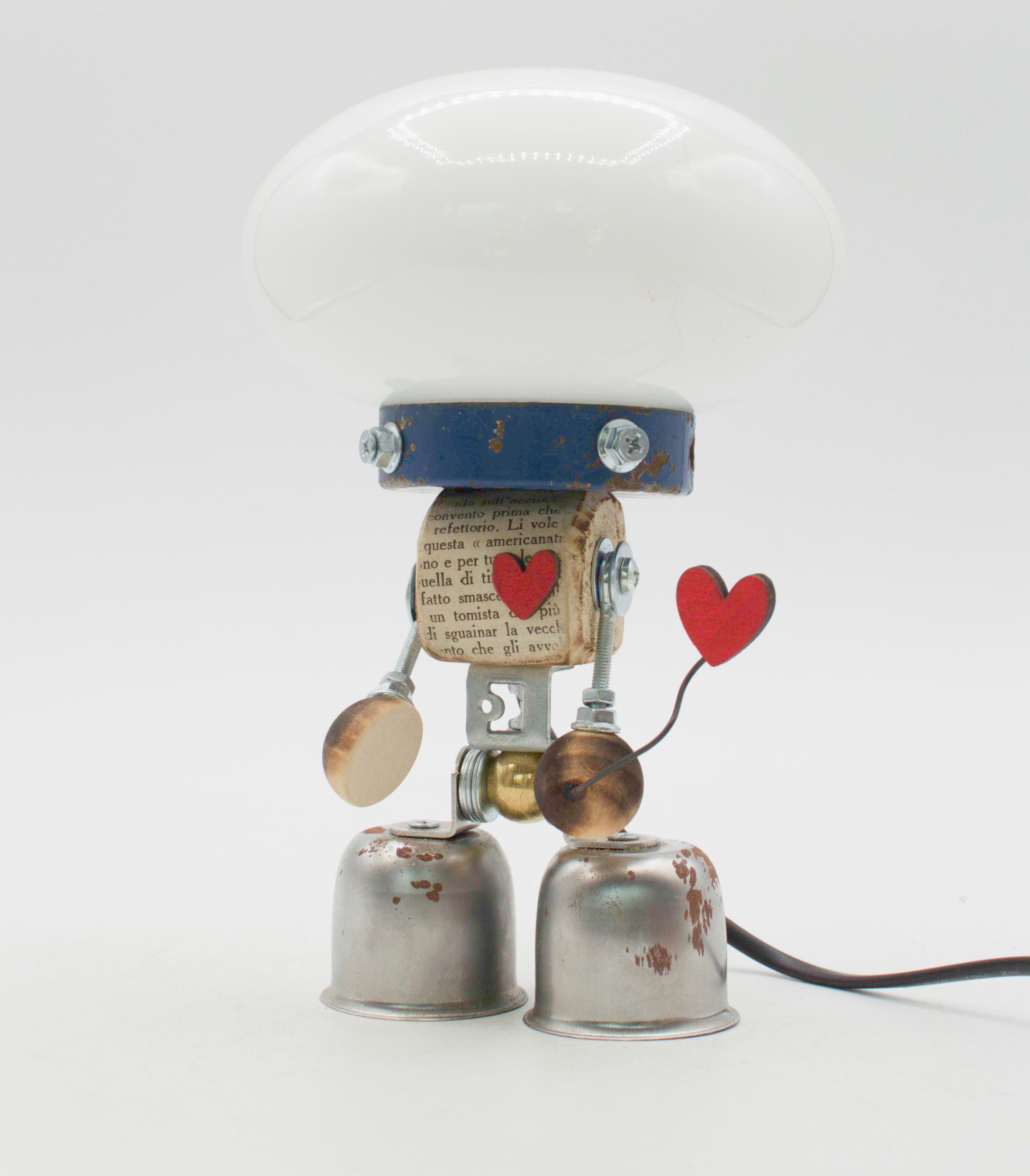 Graziosa lampada creata con forma di robot tavolo stile fanale bianca con collarino blu e piedi a campana metallici